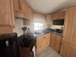 Cozy Cabin Retreat in Towyn
